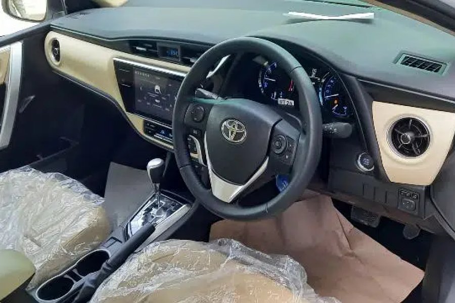 TOYOTA COROLLA GRANDE 1.8 CVT X (SUPER WHITE WITH BEIGE) (2023) (ZERO) Khanewal Road, Multan