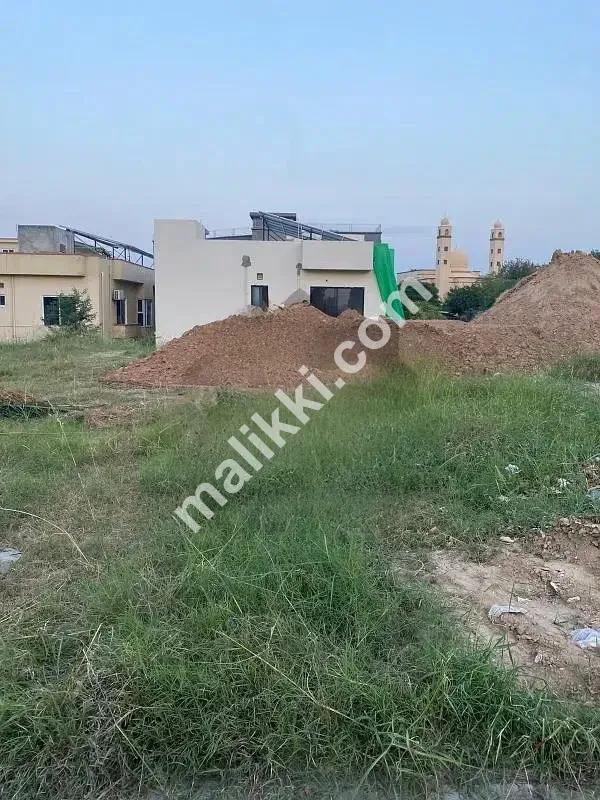 ڈی ایچ اے فیز II سیکٹر ایف میں 1 کنال پلاٹ دوسرے کونے سے-0