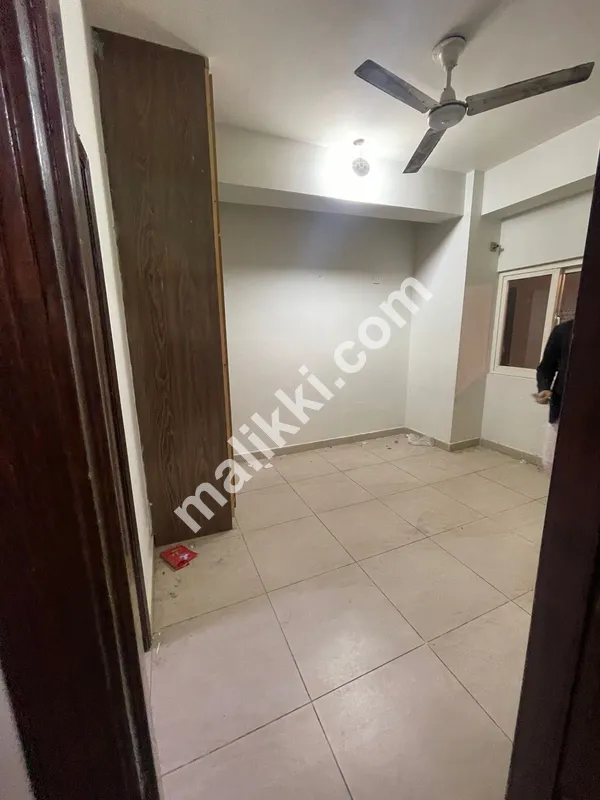 E-11/2  Unfurnished flat available for rent 