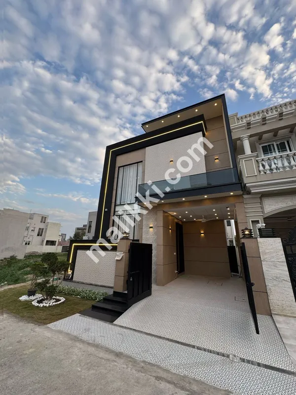 A Fully Furnished 5 Marla Designer Built Brand New House for sale in very Negotiated Price in DHA Phase 9 Town