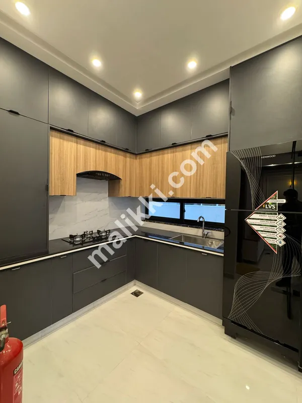 A Fully Furnished 5 Marla Designer Built Brand New House for sale in very Negotiated Price in DHA Phase 9 Town