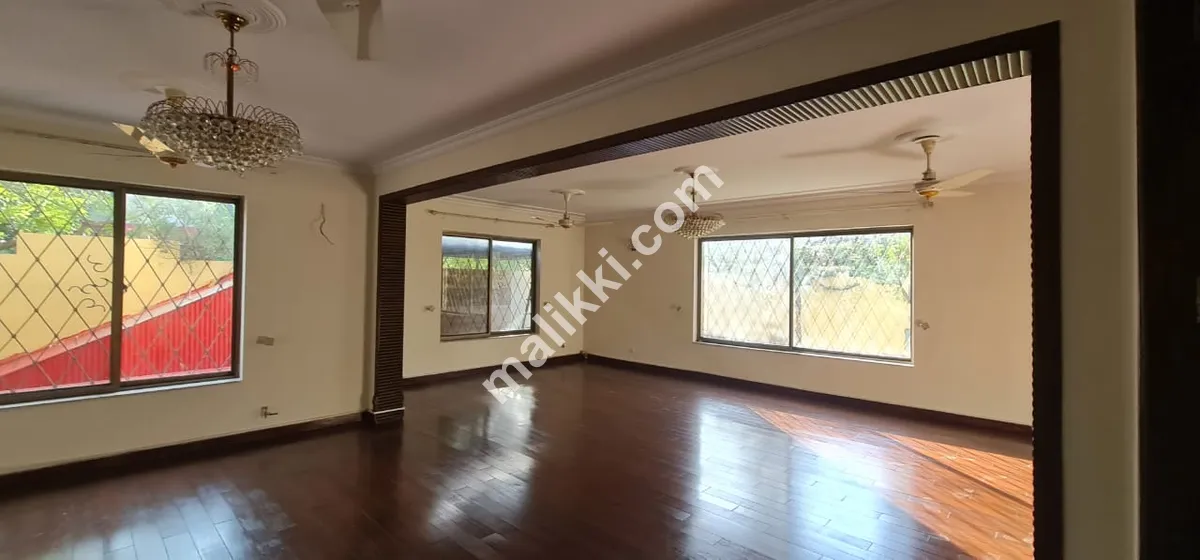 F-10/1: 1200 Yards Corner House, Double Unit, Basement, 8 Bedrooms, 2 Kitchens, Huge Drawing/Dining, 3 Huge TV Lounges, 2 Servant Quarters, 8-Car Parking, Foreigners Preferred, Rent 15 Lakh.