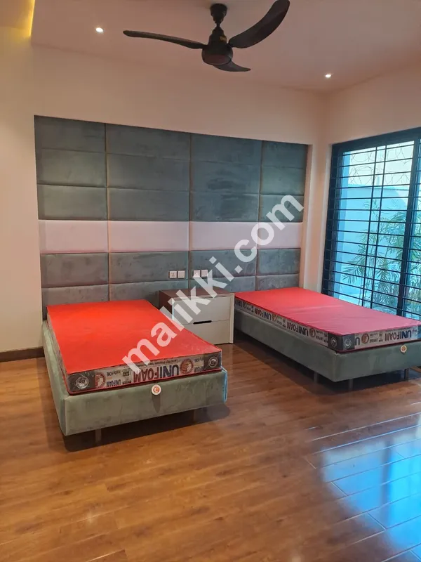 2 Single Bed with a Side Table & Fix Wall